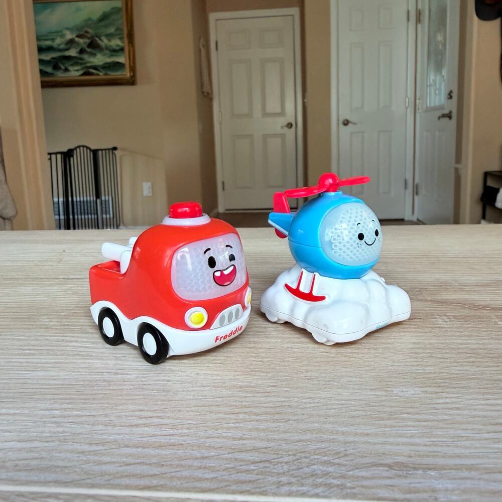 V Tech Go Go Cory Carson Car Lot mini Freddie Fire Truck mini Halle Helicopter